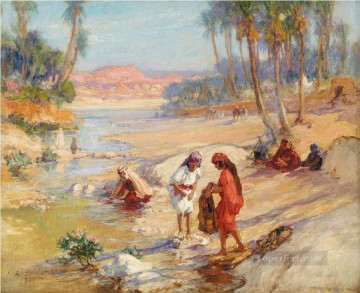 three women at the table by the lamp Painting - WOMEN WASHING CLOTHES IN A STREAM Frederick Arthur Bridgman